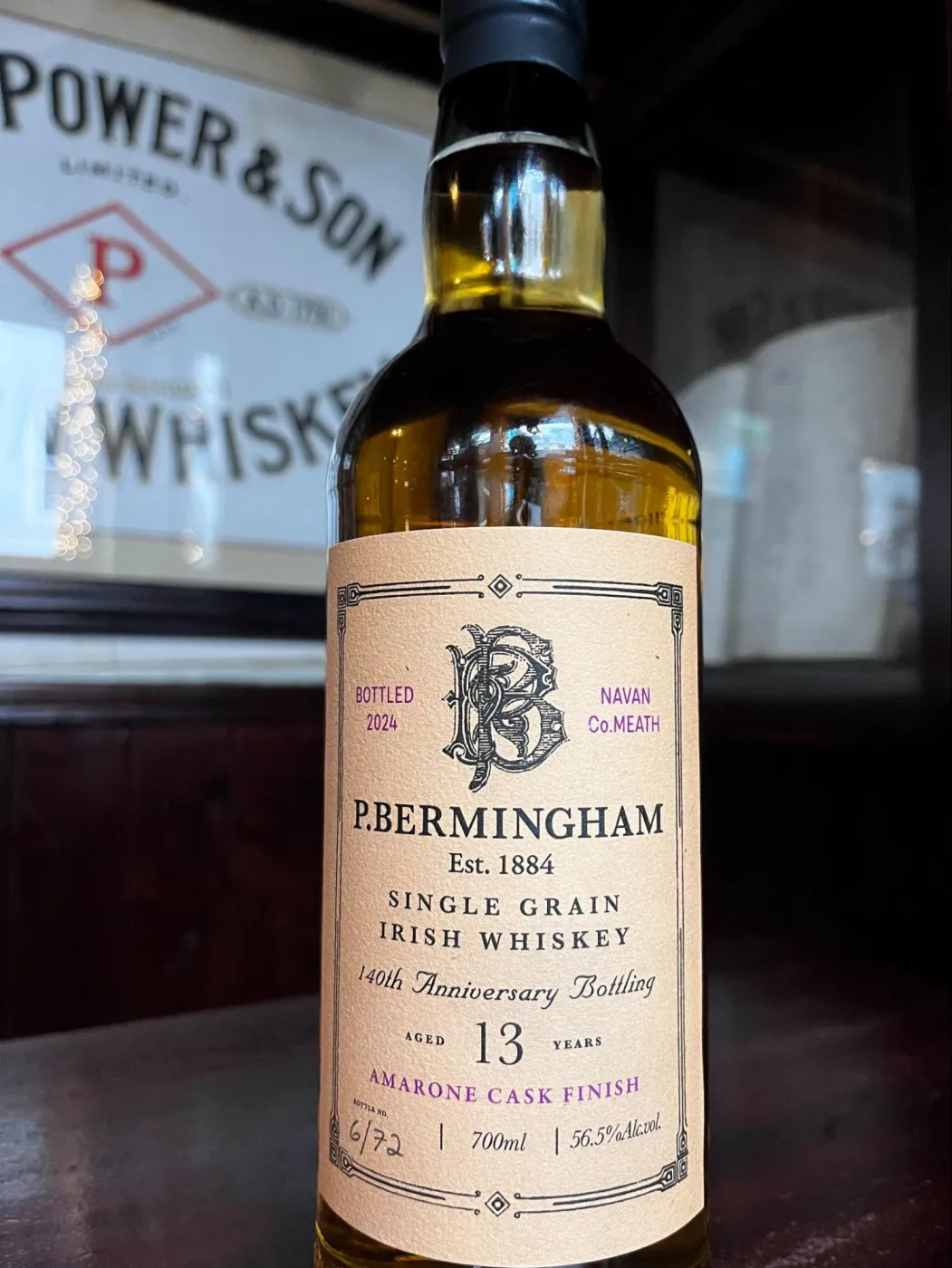 P. Bermingham release #1, a 13 year old single grain Irish whiskey bottled in 2024, on the bar