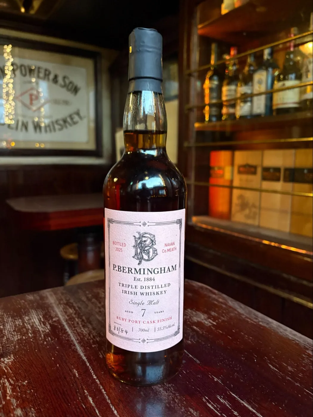 P. Bermingham release #2, a 7 year old triple distilled single malt with a ruby port cask finish, bottled in 2025, on the bar